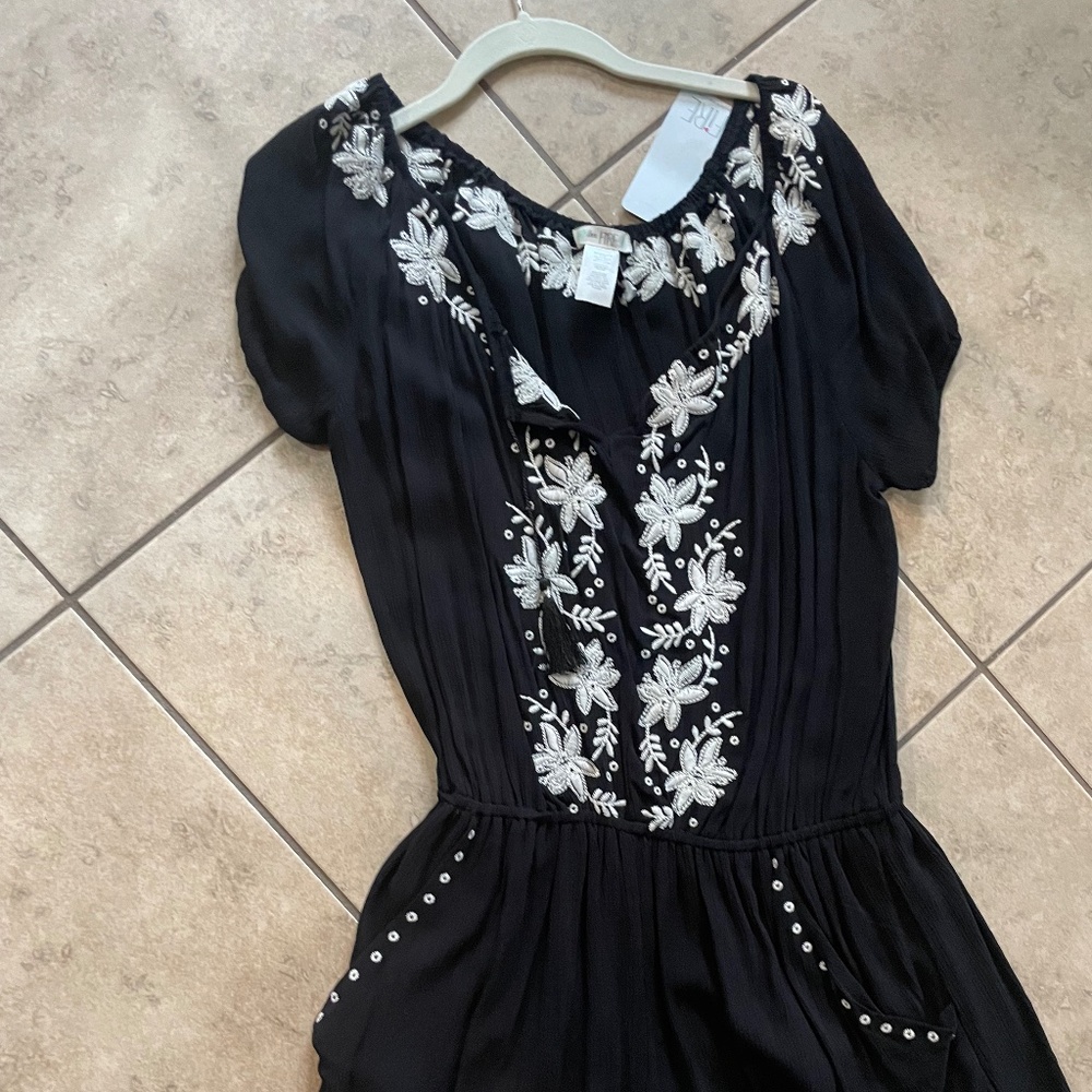 Black Romper Brand New size Large